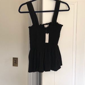 Black ruffle tank
